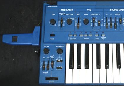 Roland-Blue SH-101 with mod grip and strap